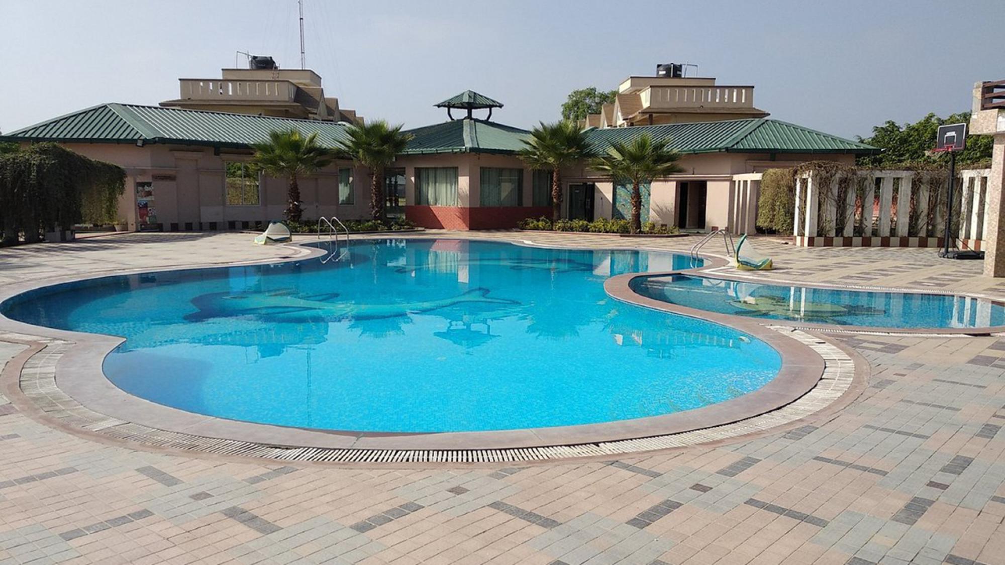 Swimming pool of Gajraj Trails Resort